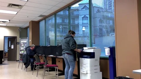 People making copy inside Service Canada with 4k resolution Video stock 69989732