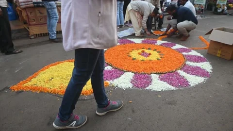 People making flower rangoli Stock Footage 233410540