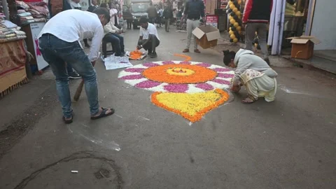 People making flower rangoli Stock Footage 233410612