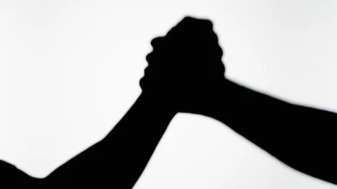 People making handshake gesture isolated on white background. Friends holding Stock Footage 170142611