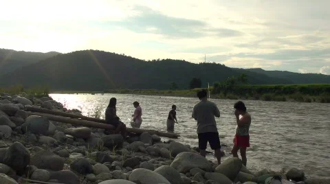 People in Manabo river Stock Footage 636488