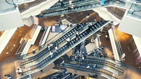 People on many fast moving Escalators In big modern shopping mall. Stock Footage 91824965