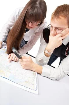 People with map Stock Photos
