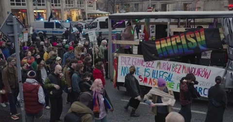 People march with rainbow flags on Independence Day. Warsaw, Poland, 2023 Stock Footage 255518295