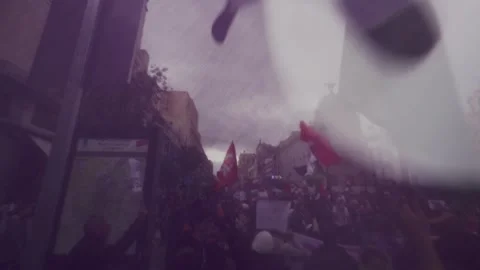 People marching and shouting with flags during Pro-Palestine March in Madrid 스톡 동영상 254368826