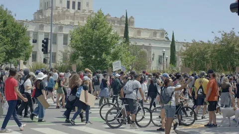 People marching down the street, BLM, Beverly Hills, California, June 6 2020 Stock Footage 136756073