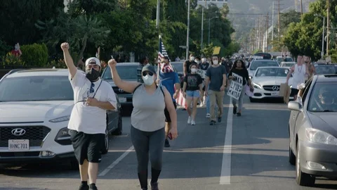 People marching down the street, protesting, BLM, Hollywood, LA, June 2020 Stock Footage 134644913