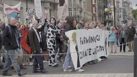 People Marching from Left to Right on the Streets of London 스톡 동영상 263815902