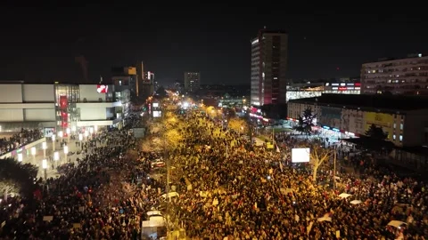People marching together during a protest against enormous corruption in Serbia Stock Footage 300907552