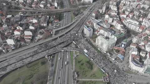 People marching together during a protest against enormous corruption in Serbia Stock Footage 300907563
