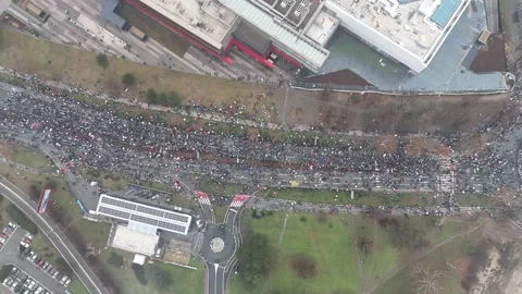 People marching together during a protest against enormous corruption in Serbia Stock Footage 300994676