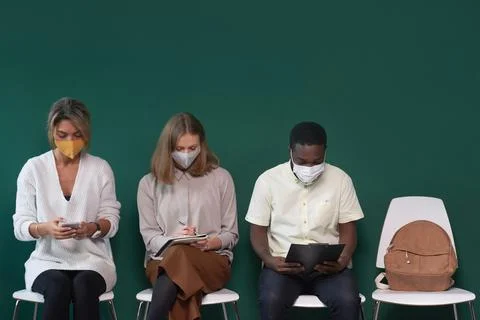 People In Masks Waiting In Queue 스톡 사진