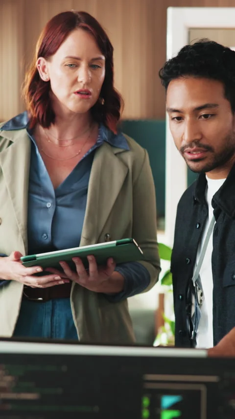 People, mentor and computer in office for programming, research and training for Stock Footage 342243045