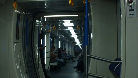 People in metro train using phone. Stockbeeldmateriaal 113631274