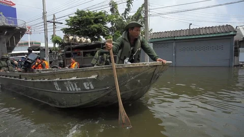 People migrate to safe area during a big flooding Stock Footage 96230254