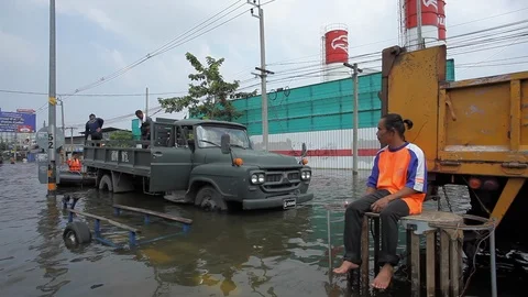 People migrate to safe area during a big flooding Stock Footage 96230310