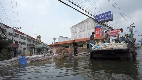 People migrate to safe area during a big flooding Stock Footage 96230475