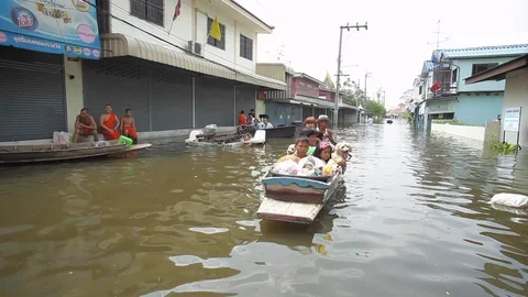 People migrate to safe area during a big flooding Stock Footage 96230989