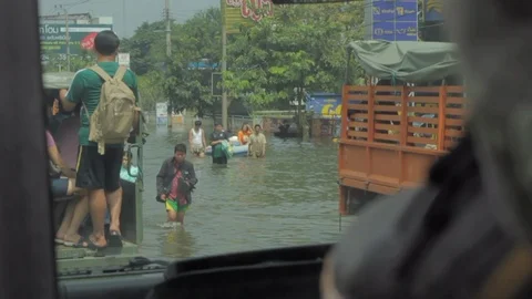 People migrate to safe area during a big flooding Stock Footage 96231184