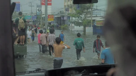 People migrate to safe area during a big flooding Stock Footage 96231462