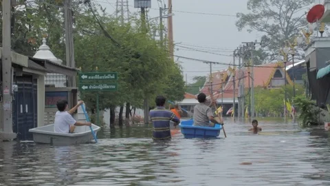People migrate to safe area during a big flooding Stock Footage 96232867