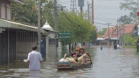 People migrate to safe area during a big flooding Stock Footage 96233244