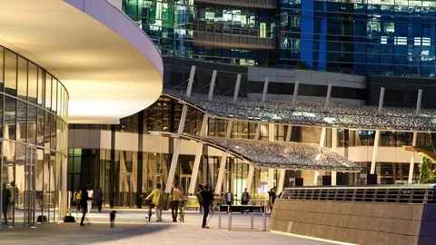 People in Modern Complex at Night Stock Footage 98498382