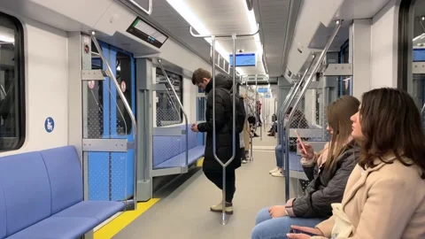 People in modern subway's train Stock Footage 143072383