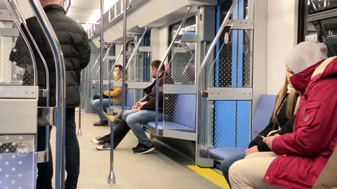 People in modern subway's train Stock Footage 143072389