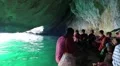 People on motorboat in grotto, Musandam peninsula, Sultanate of Oman HD Footage