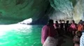 People on motorboat inside grotto, Musandam peninsula, Sultanate of Oman HD Footage