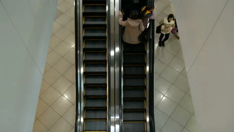 People move along the escalator. Stock Footage 166730283