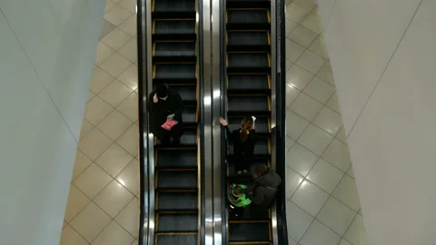 People move along the escalator. Stock Footage 166730331