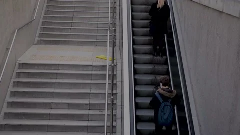 People moving from the escalator Stock Footage 146291324