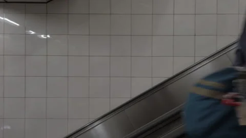 People moving on escalator . Stock Footage 240798625