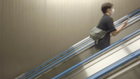 People moving on escalator. Stock Footage 254053333