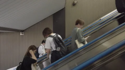 People moving on escalator. Stock Footage 254053361