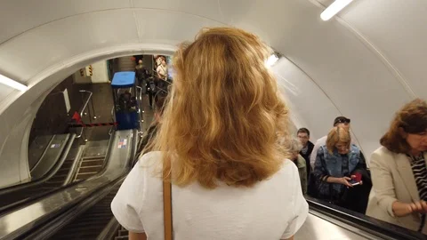 People on a moving escalator in the subway. Stock Footage 114806006