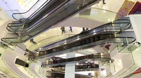 People on moving escalators at modern shopping mall, Hong Kong Stock Footage 59797842