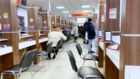 People in the Multifunctional Center for provision of state &amp; municipal services Stock Footage 170723895