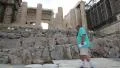 People near ancient temple in Athenian Acropolis, Greece HD Footage
