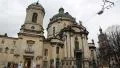 People near Dominican church and monastery in Lviv, Western Ukraine HD Footage