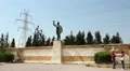 People near monument to the Battle of Thermopylae and statue of Leonidas, Greece HD Footage