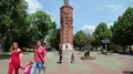 People near old water tower in Vinnytsia city, Ukraine HD Footage