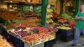 People near shop counter with fresh fruits on the market place HD Footage