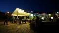 People near summer restaurant in Greece HD Footage
