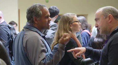People networking at a conference Stock Footage 64566077