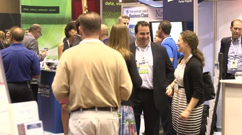 People networking at a tradeshow Stock Footage 49386813