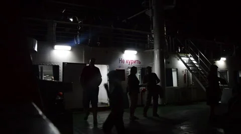 People at night on the deck Stock Footage 54690546