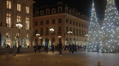 People at night strolling through the streets of Paris with Christmas Stock Footage 241398269